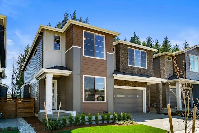 view of front of property featuring a garage