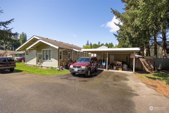 view of front of home with a carport