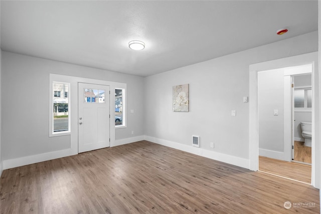 foyer entrance featuring hardwood / wood-style flooring