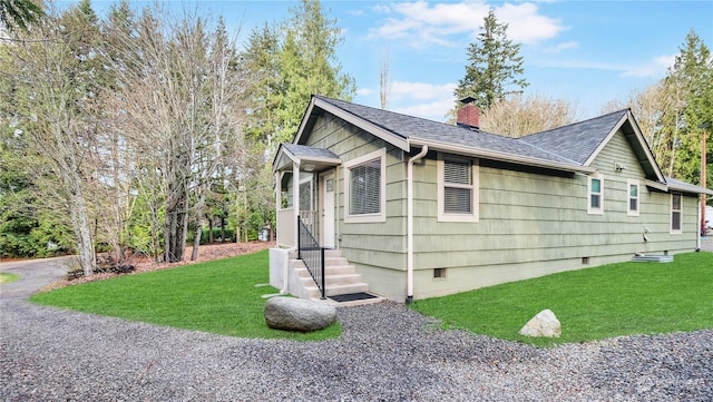 view of home's exterior featuring a lawn