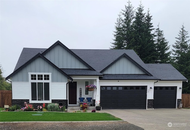 view of front of property with a front lawn and a garage