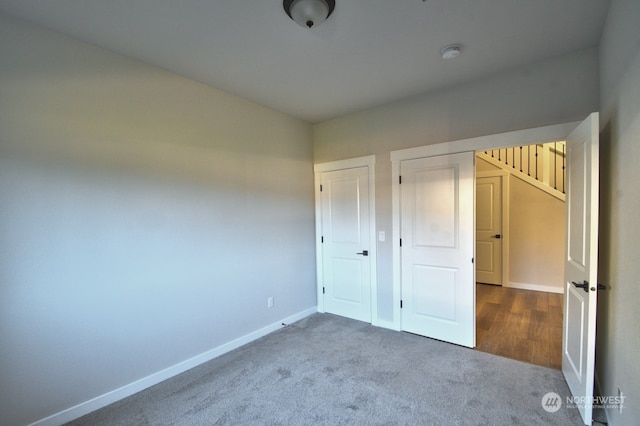 unfurnished bedroom featuring carpet floors