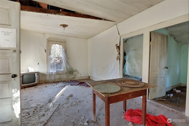 misc room featuring lofted ceiling