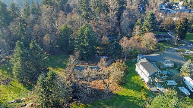 aerial view featuring a view of trees