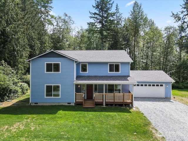 view of property featuring a front lawn, a porch, and a garage