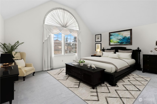 bedroom featuring vaulted ceiling