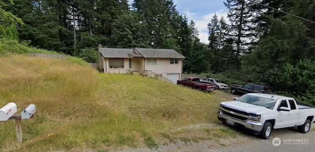 view of front of property featuring an attached garage