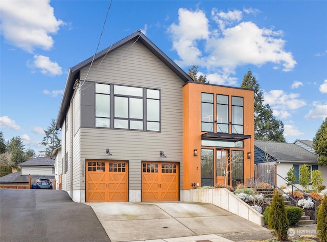 contemporary home featuring a garage