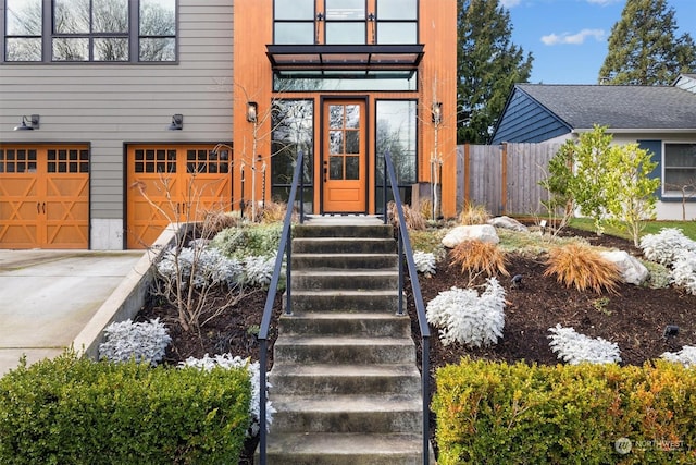 doorway to property featuring a garage