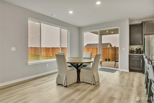 dining room featuring light hardwood / wood-style floors