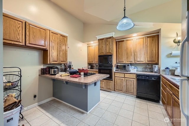 kitchen featuring black appliances, kitchen peninsula, hanging light fixtures, and light tile patterned floors