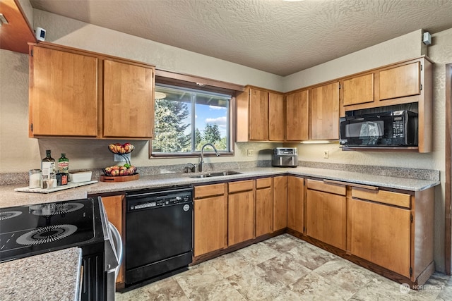309 E State Route 4, Cathlamet, WA 98612 - kitchen with black appliances, a sink, light countertops, brown cabinetry, and a textured ceiling