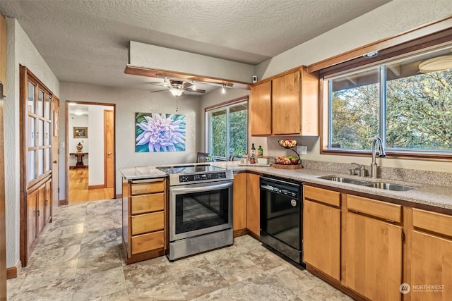 kitchen featuring dishwasher, sink, kitchen peninsula, a textured ceiling, and stainless steel range with electric stovetop