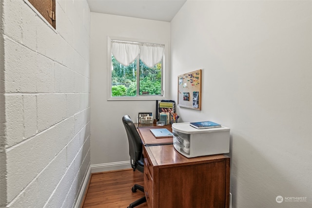 office space with hardwood / wood-style flooring