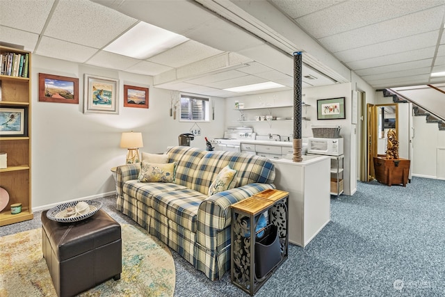 309 E State Route 4, Cathlamet, WA 98612 - living area with a drop ceiling, carpet, stairway, and baseboards