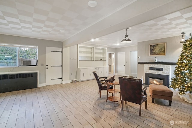 dining space with radiator heating unit, light hardwood / wood-style flooring, cooling unit, and crown molding