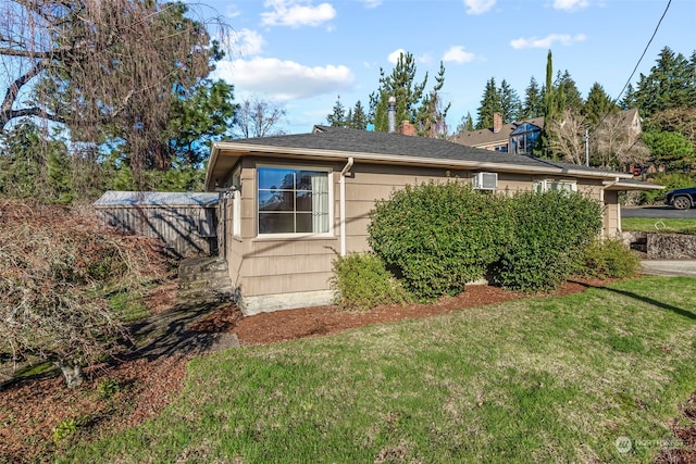 view of home's exterior featuring a yard