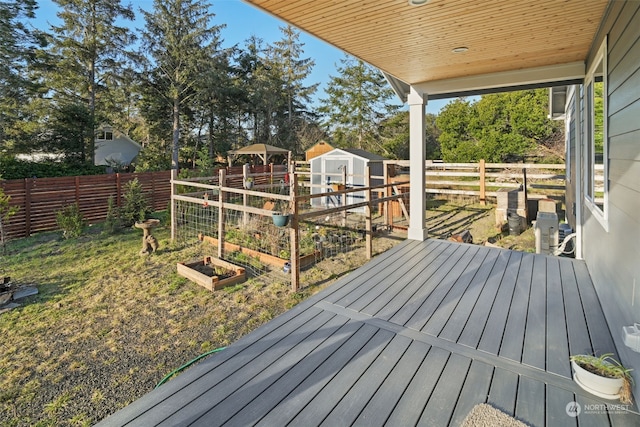 deck with a storage shed