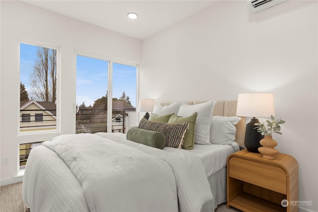 bedroom with a wall unit AC