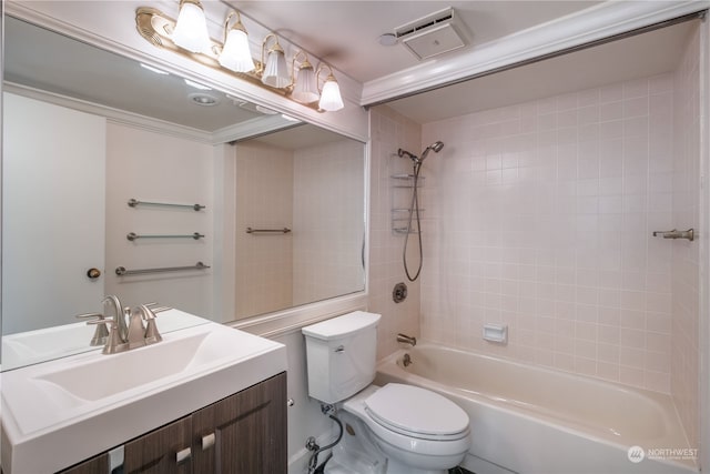 full bathroom with vanity, toilet, and tiled shower / bath