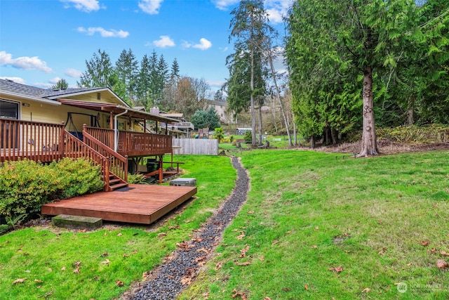 view of yard featuring a deck