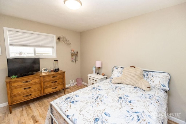 bedroom featuring light hardwood / wood-style floors