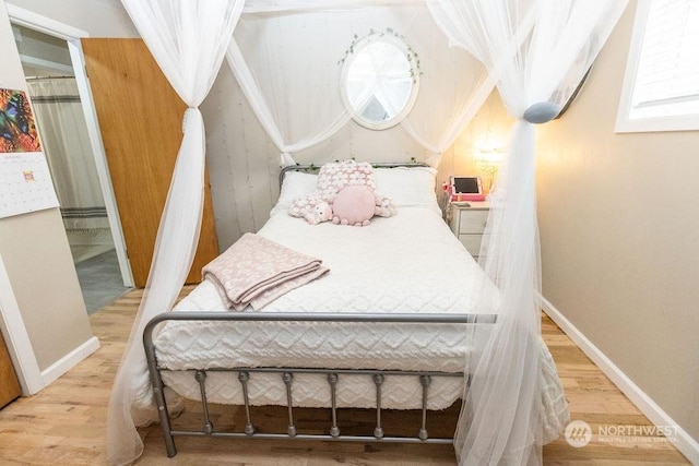 bedroom featuring hardwood / wood-style flooring