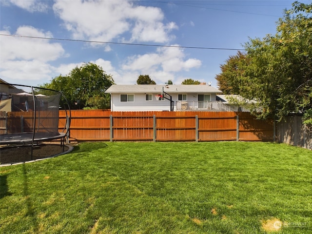 view of yard featuring a trampoline