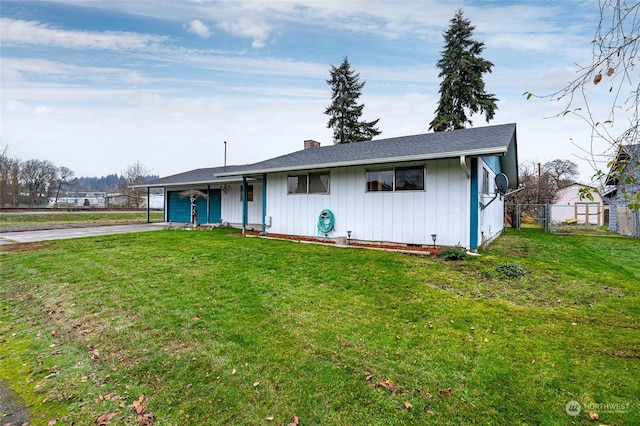 ranch-style home with a front yard