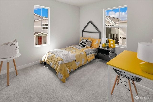 bedroom featuring light colored carpet