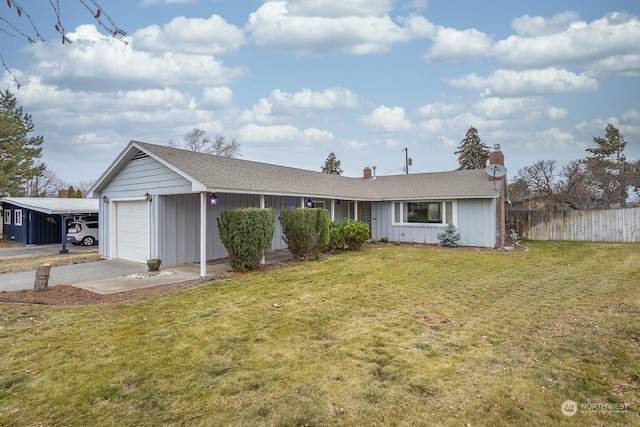 ranch-style home with a garage and a front yard