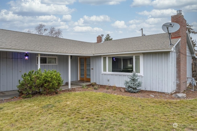 single story home with a front yard