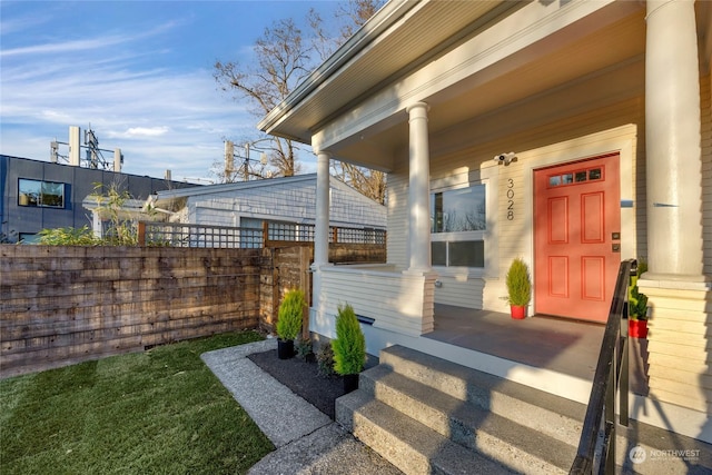 doorway to property with covered porch