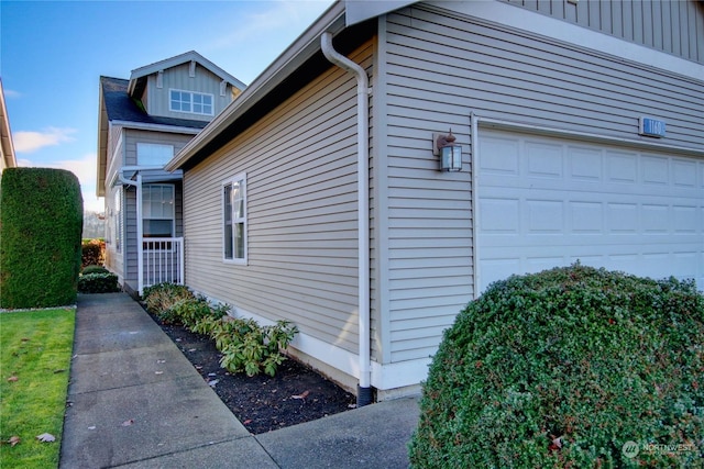 view of home's exterior featuring a garage