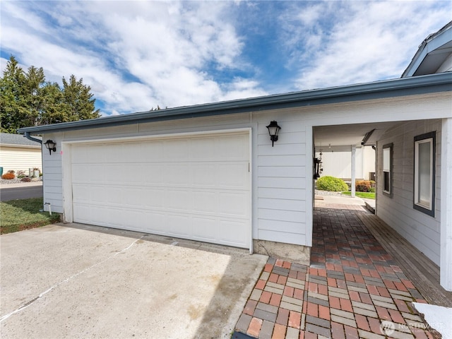 garage with driveway