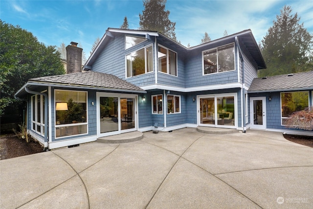 back of house with a patio area