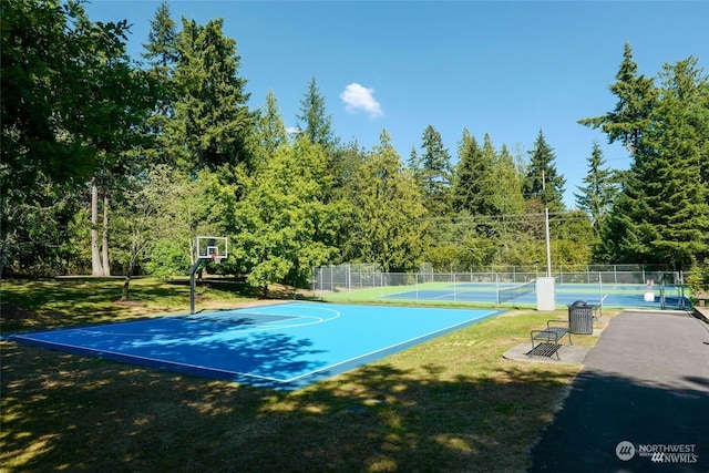 view of sport court featuring tennis court