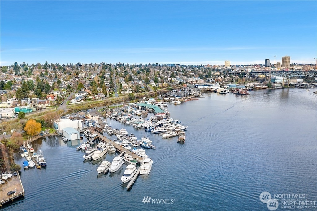 birds eye view of property featuring a water view