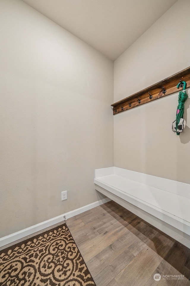 mudroom with light hardwood / wood-style flooring