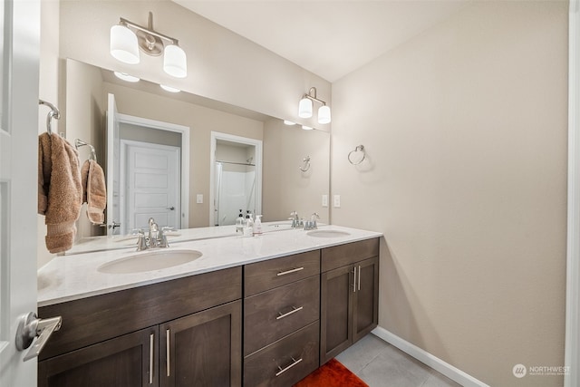 bathroom featuring tile patterned floors and vanity