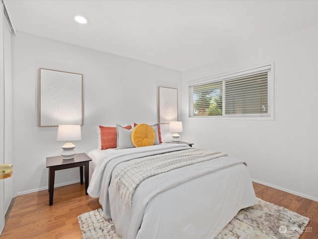 bedroom featuring light wood-type flooring