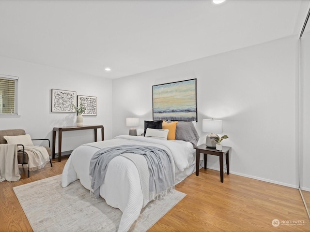 bedroom featuring light hardwood / wood-style flooring