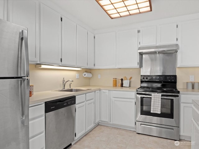 kitchen with white cabinetry, sink, and appliances with stainless steel finishes