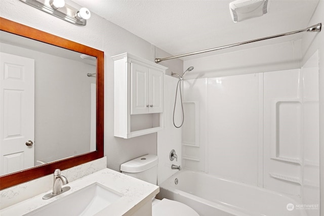 full bathroom featuring vanity, shower / bath combination, a textured ceiling, and toilet