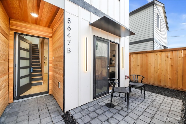 doorway to property featuring a patio