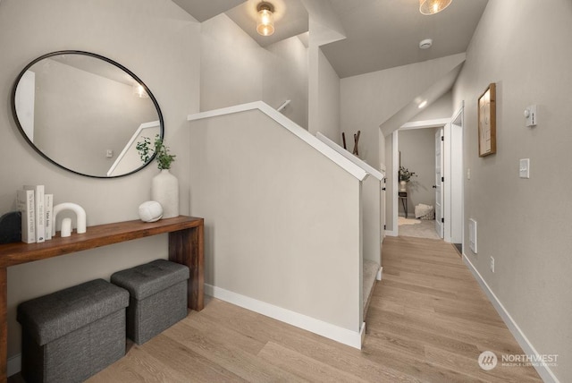 stairway featuring hardwood / wood-style flooring