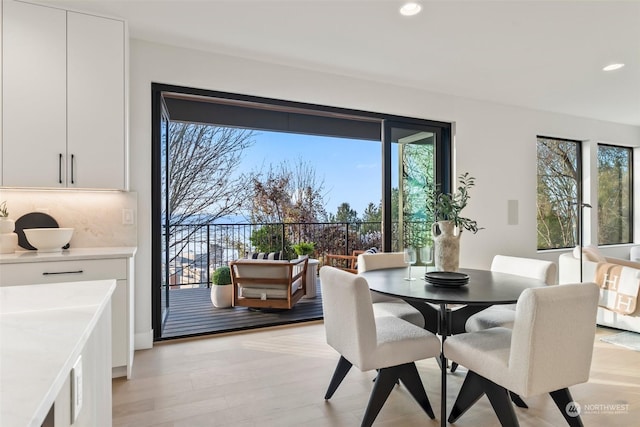 dining room featuring light hardwood / wood-style flooring