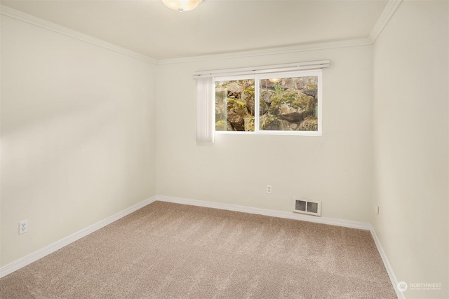 unfurnished room with crown molding and carpet