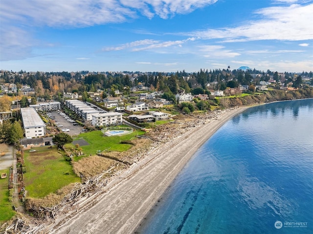 aerial view featuring a water view and a beach view