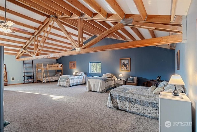 carpeted bedroom featuring beam ceiling and high vaulted ceiling